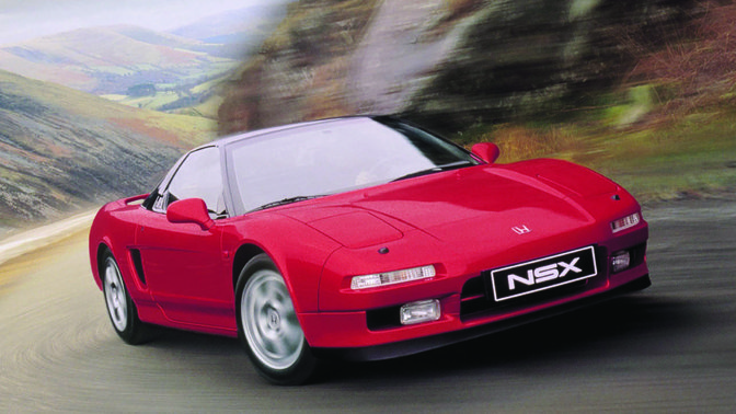 Přední tříčtvrtinový pohled na model Honda NSX v horské krajině